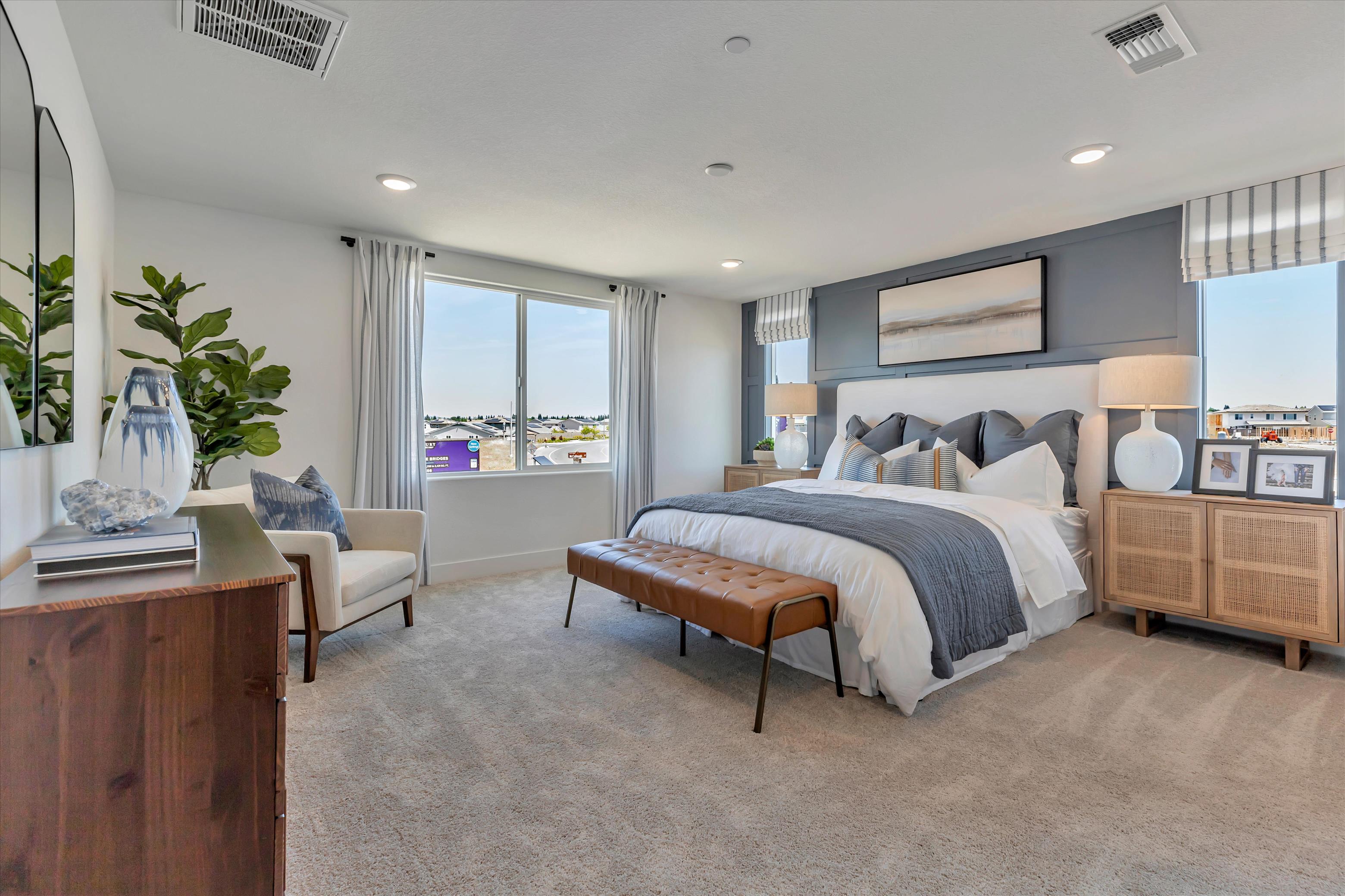 A bedroom with two beds.