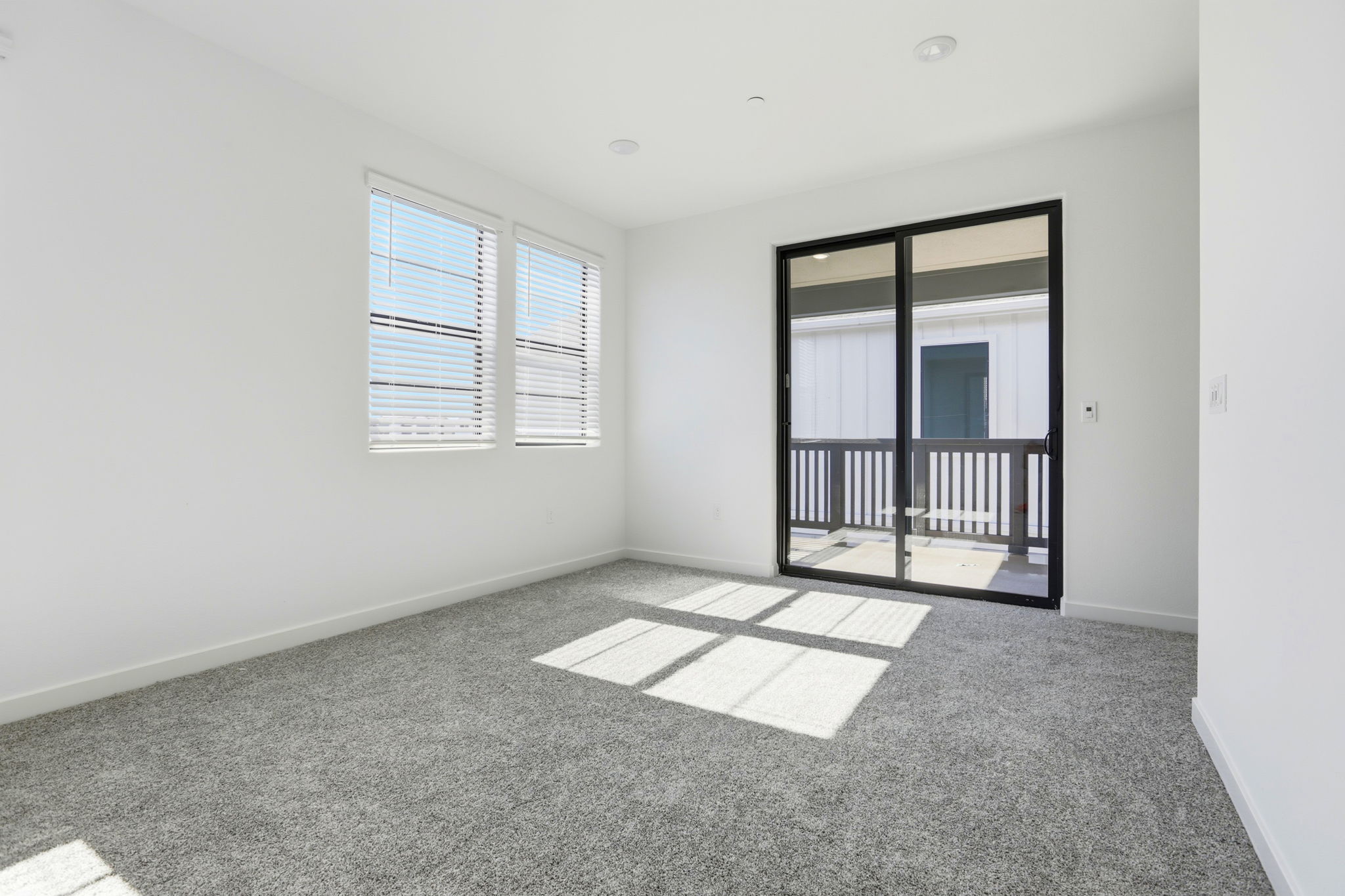 A room with a gate and a window.