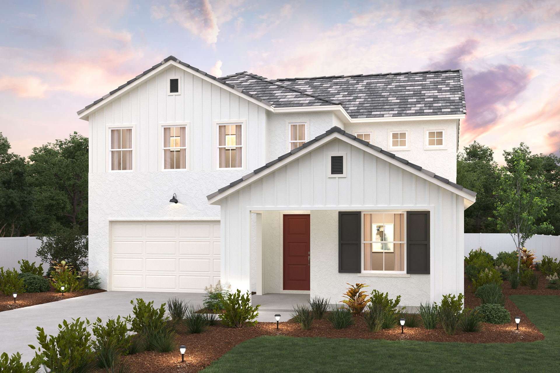 A white house with a black roof.