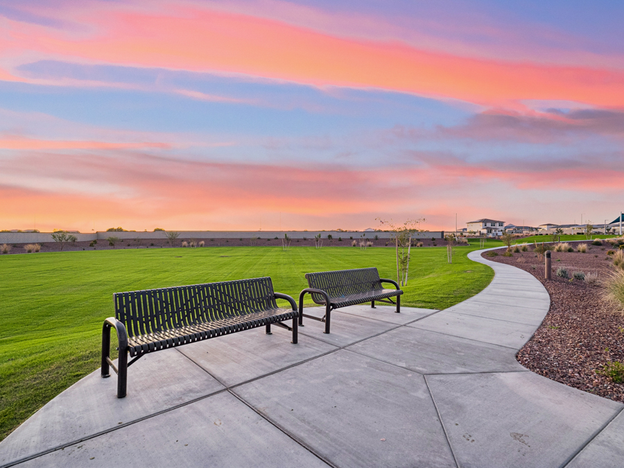 Benches on a sidewalk.