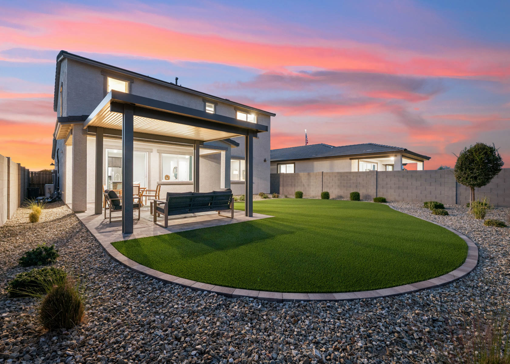 A building with a large lawn.