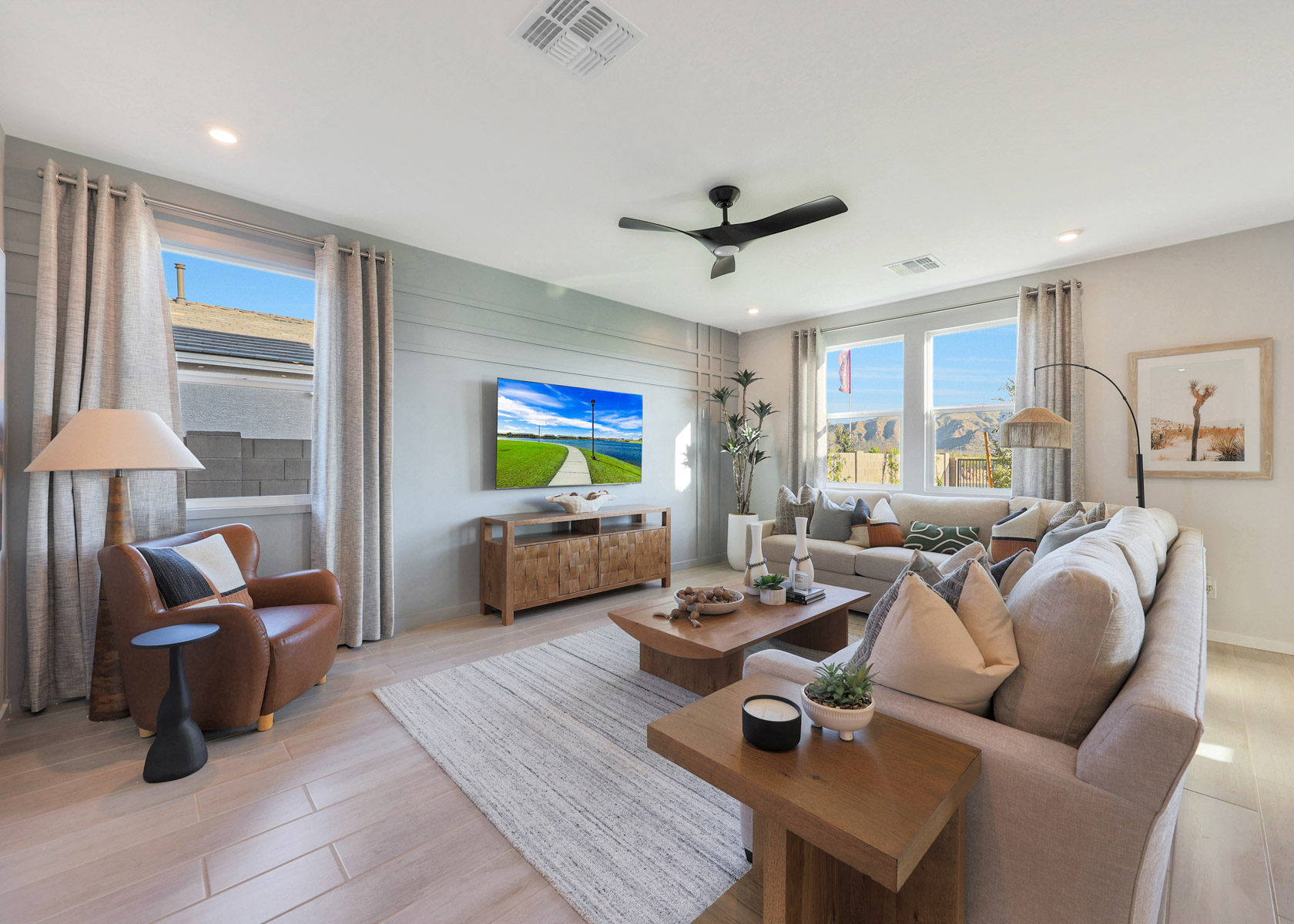A living room with a large window.