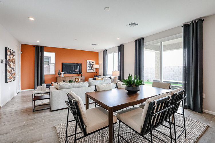 A living room with a large table.