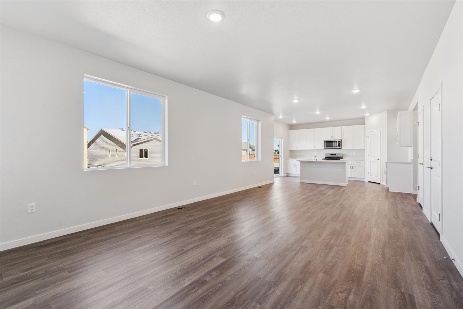 A large empty room with white walls.