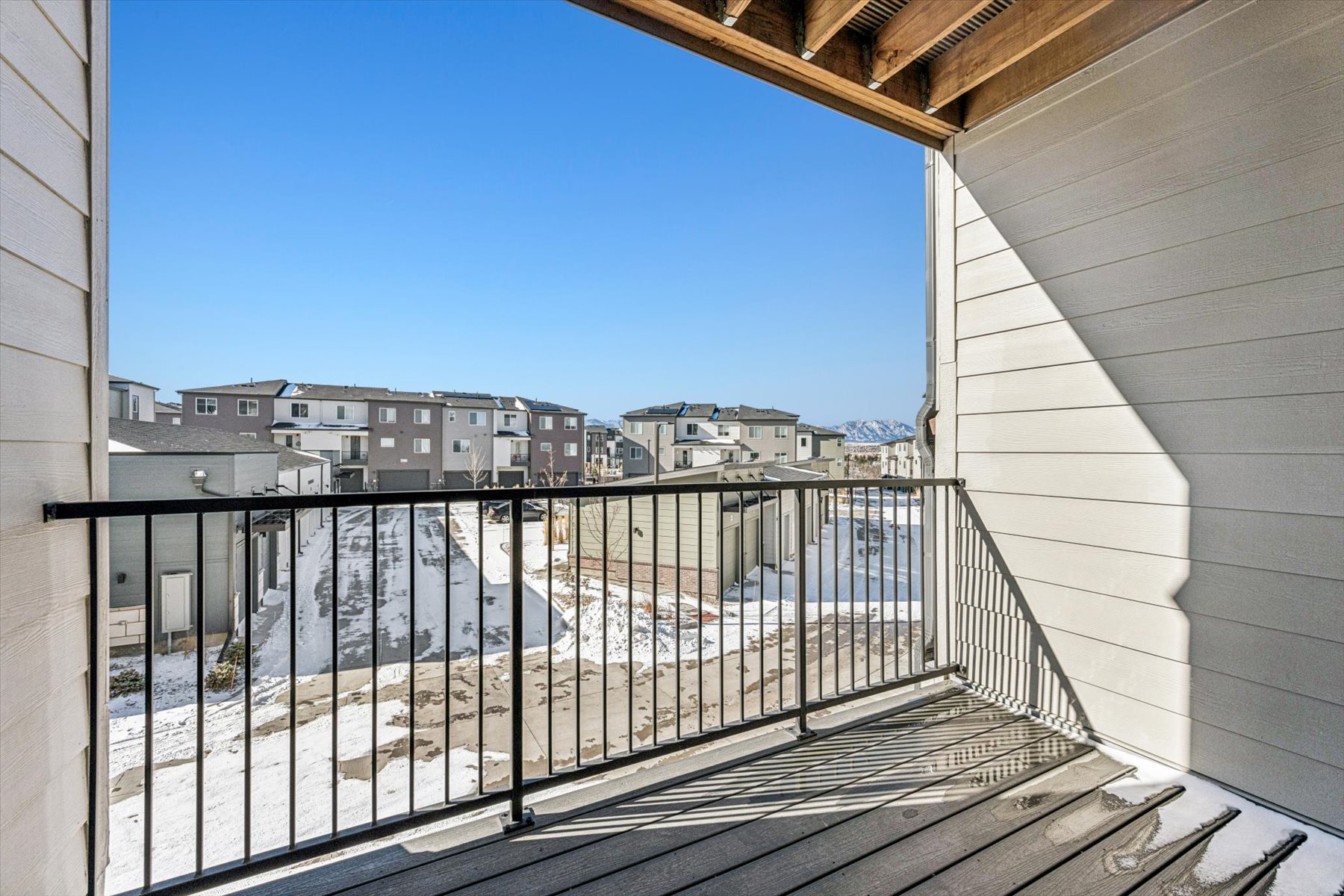 A view of a city from a balcony.
