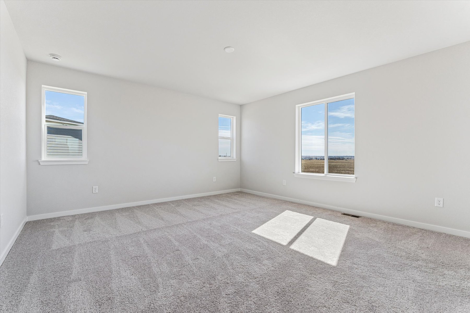 A room with a few windows.