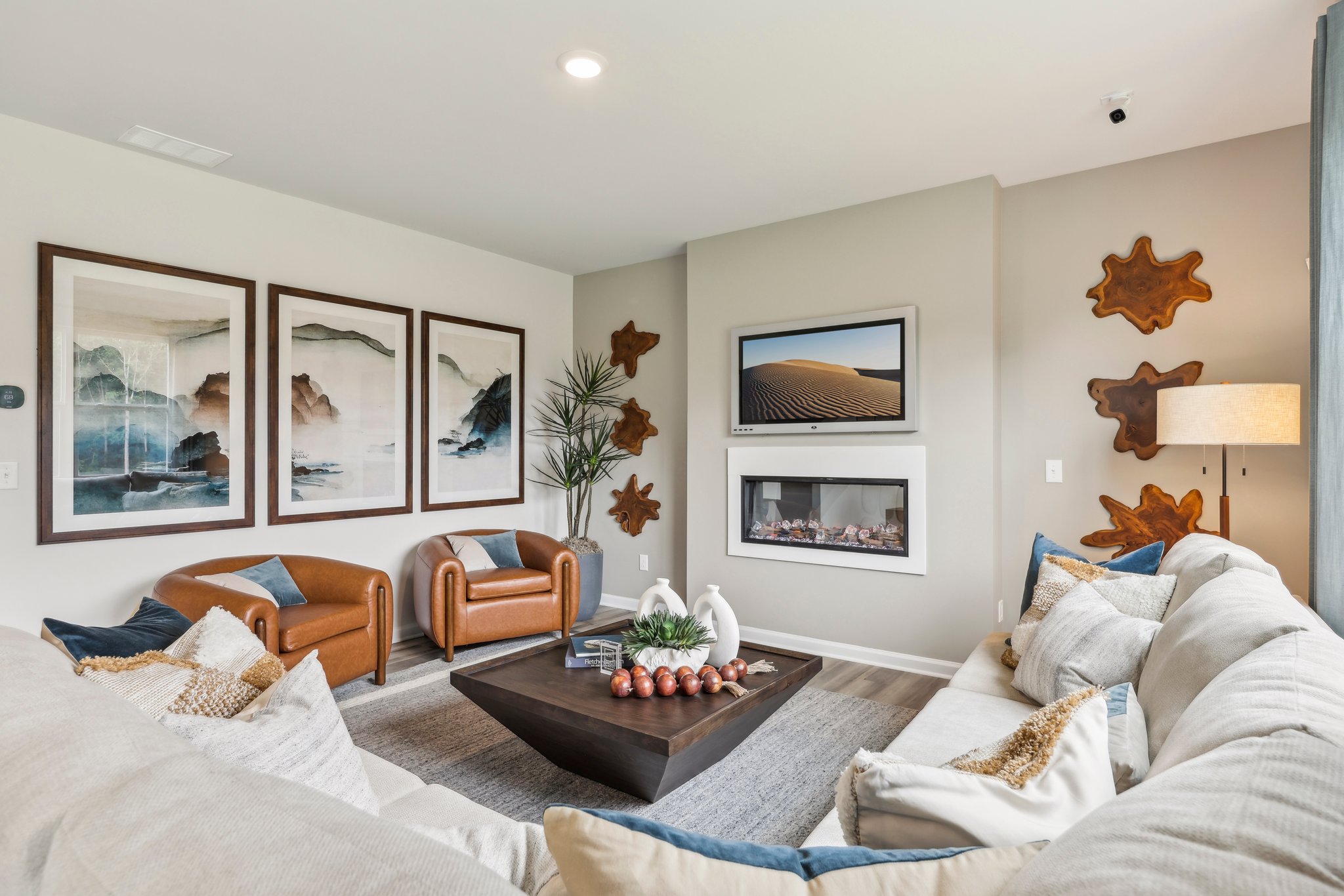 A living room with a large mirror.