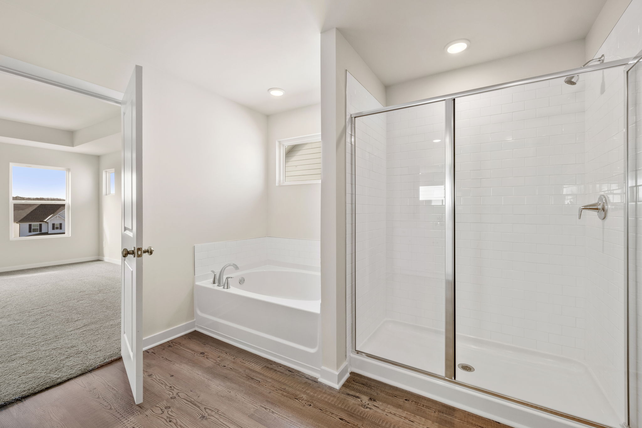 A bathroom with a glass shower.