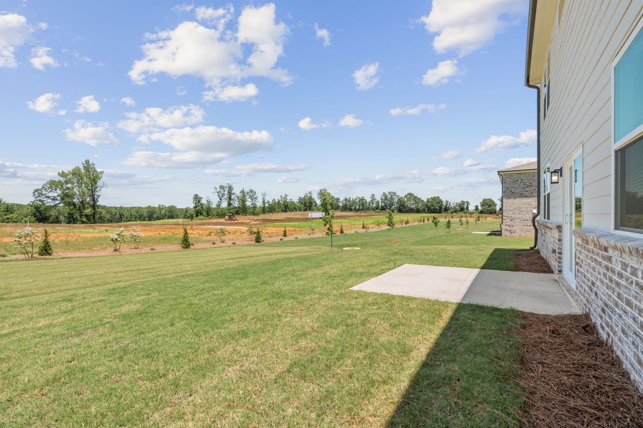A large green lawn.