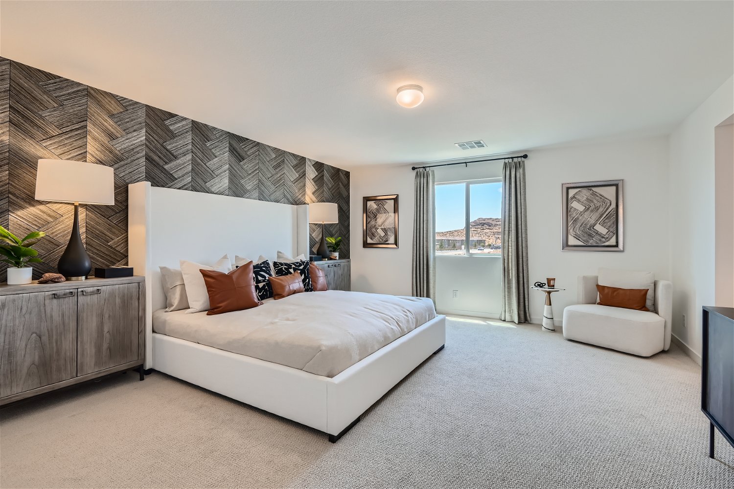 A bedroom with a large bed.