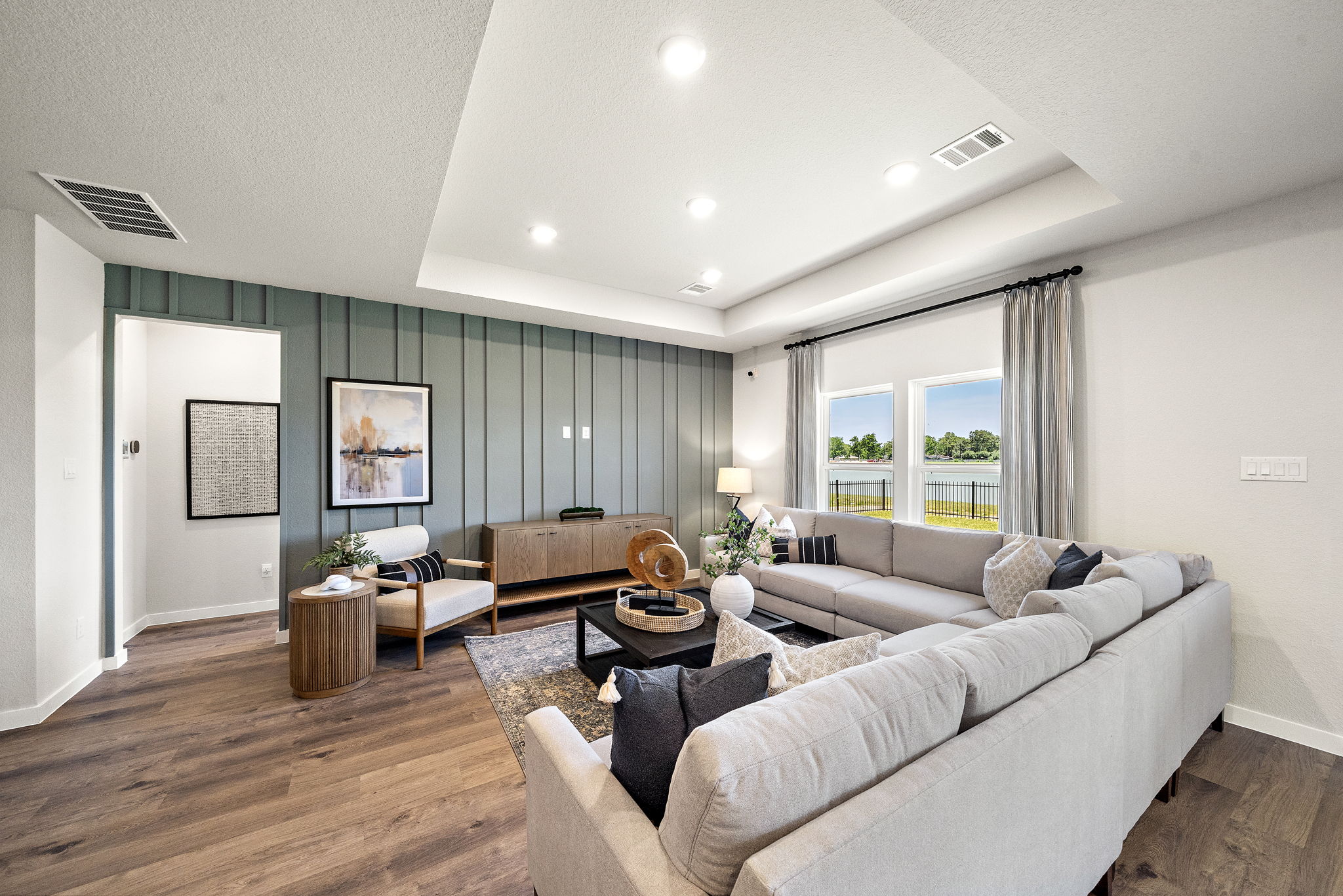 A living room with a large window.