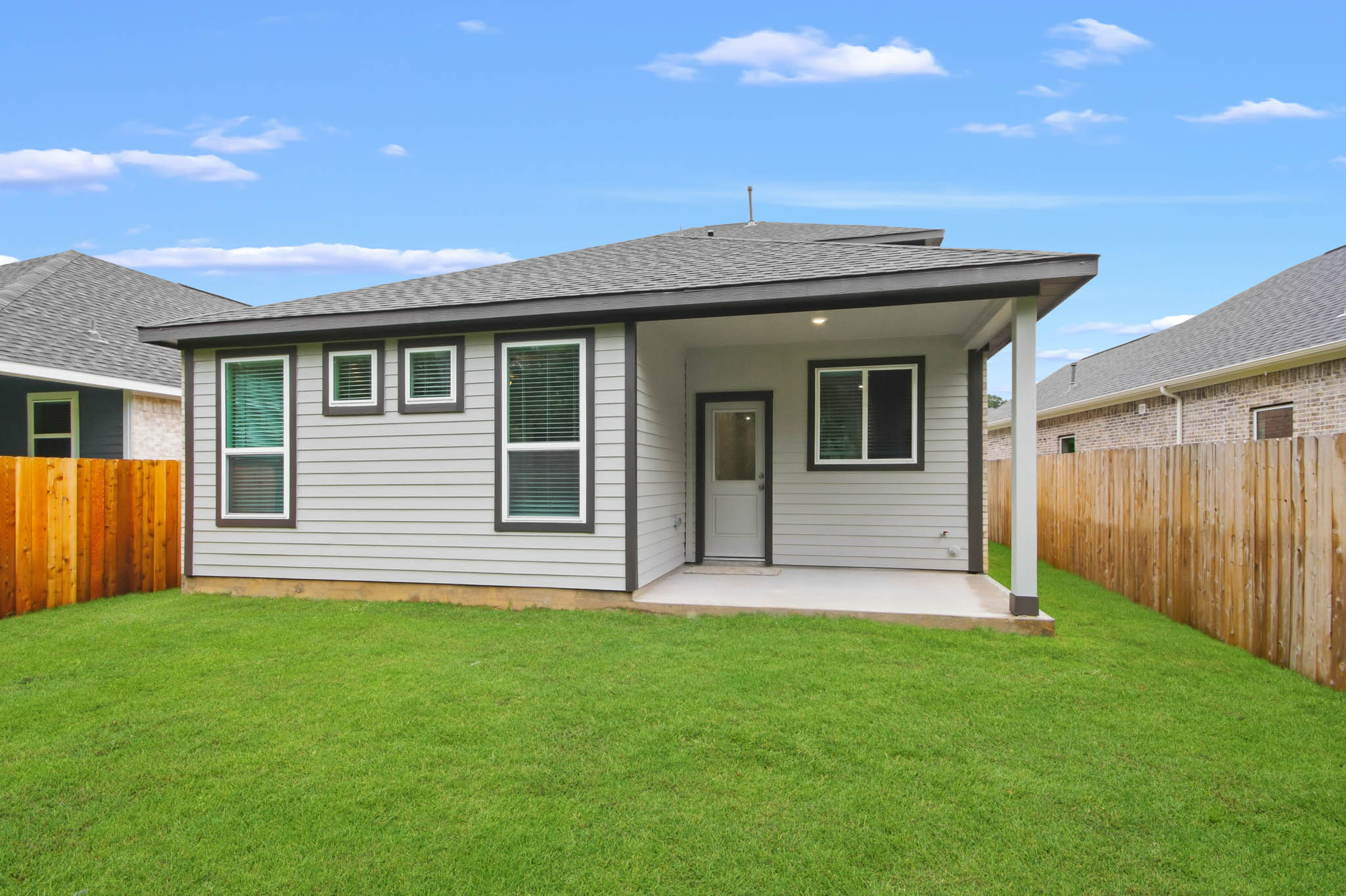 A house with a fence around it.