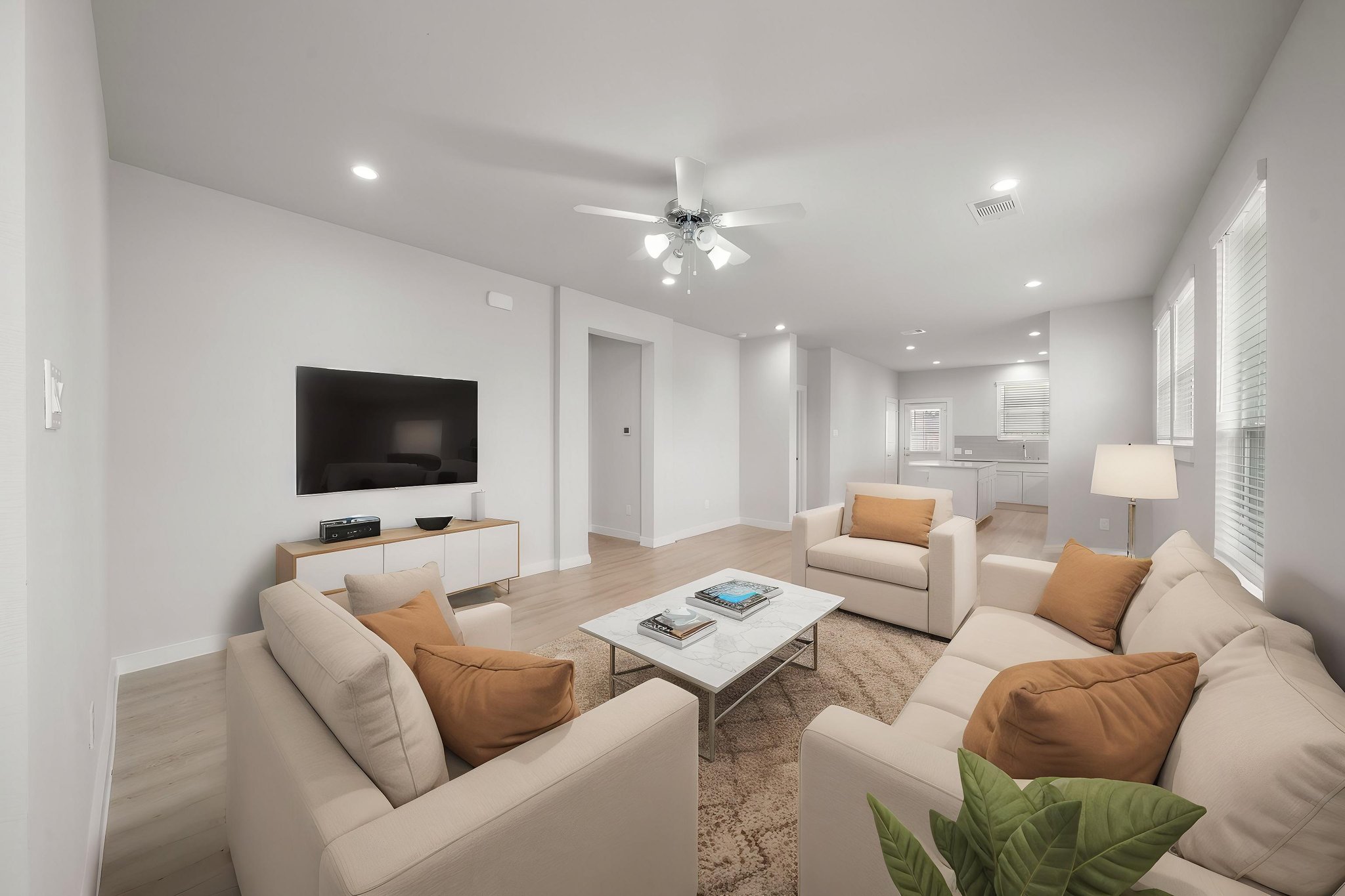 A living room with a tv and couches.