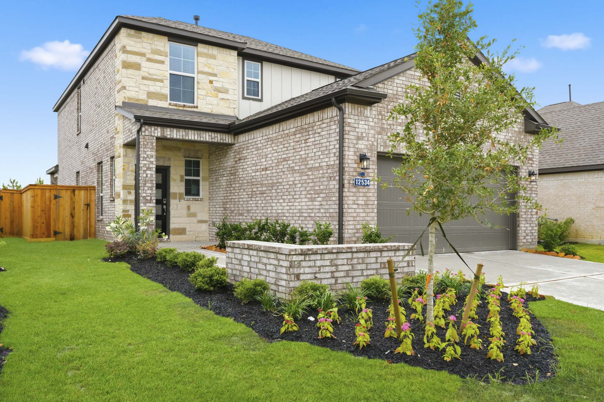 A house with a large front yard.