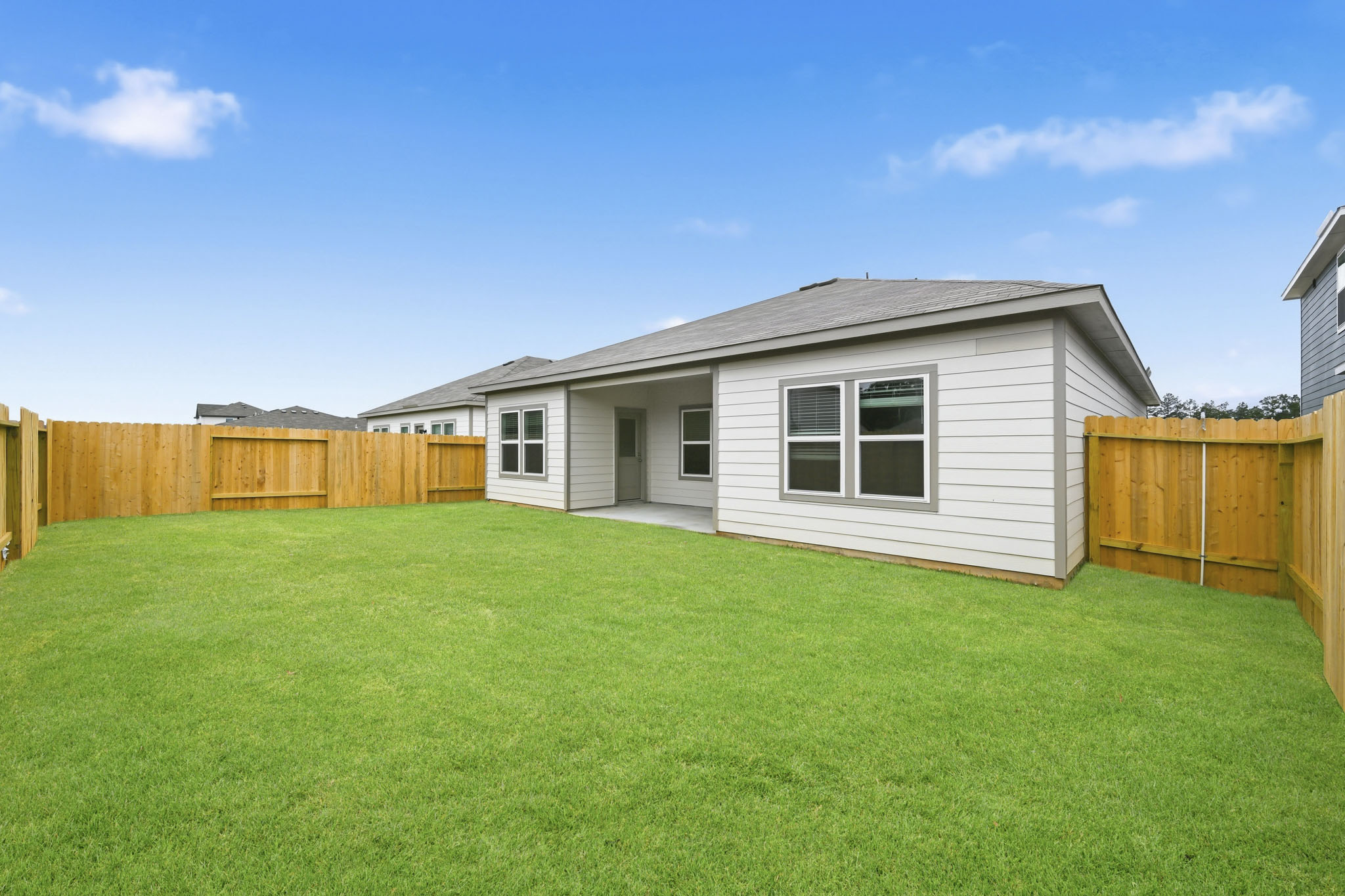 A house with a fence around it.