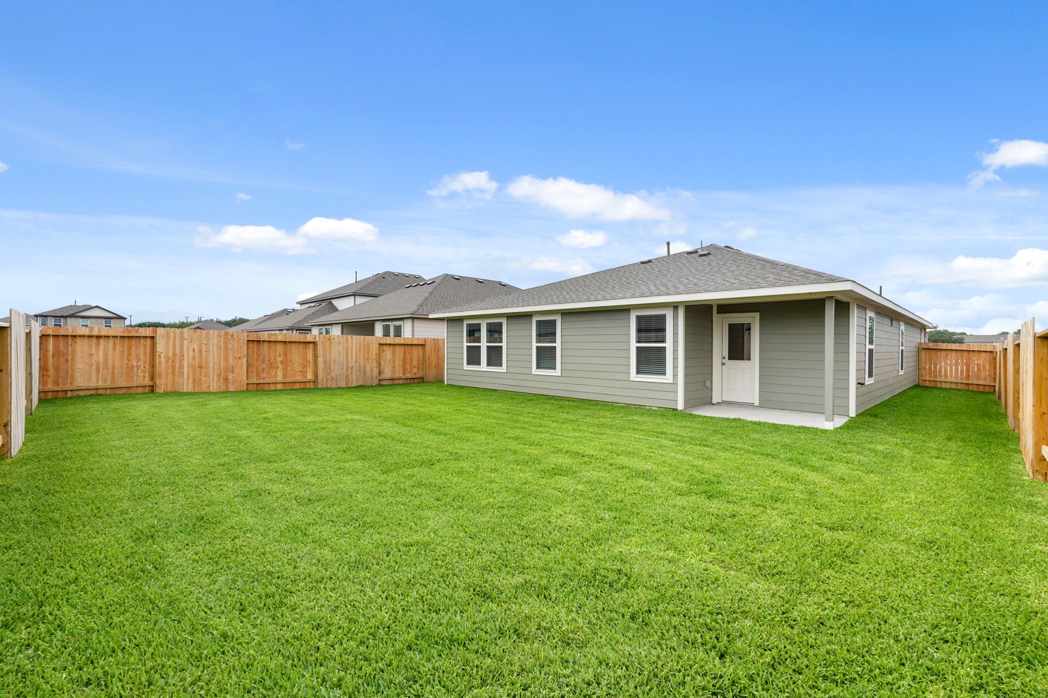 A house with a fence around it.
