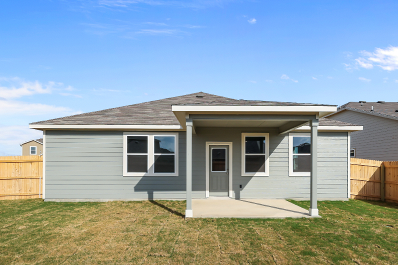 A house with a fence around it.