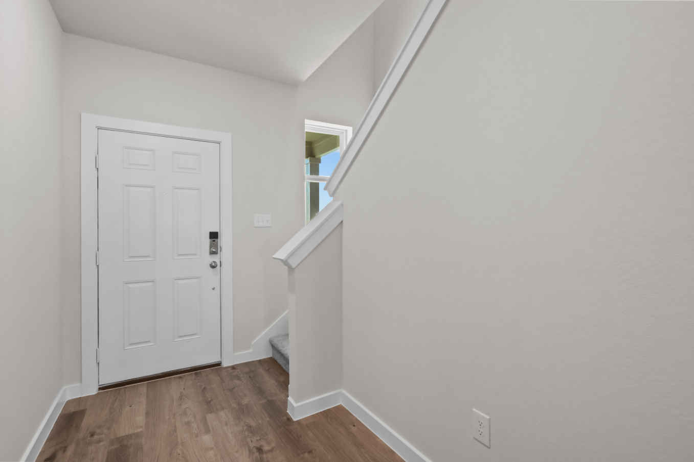 A white door in a room.