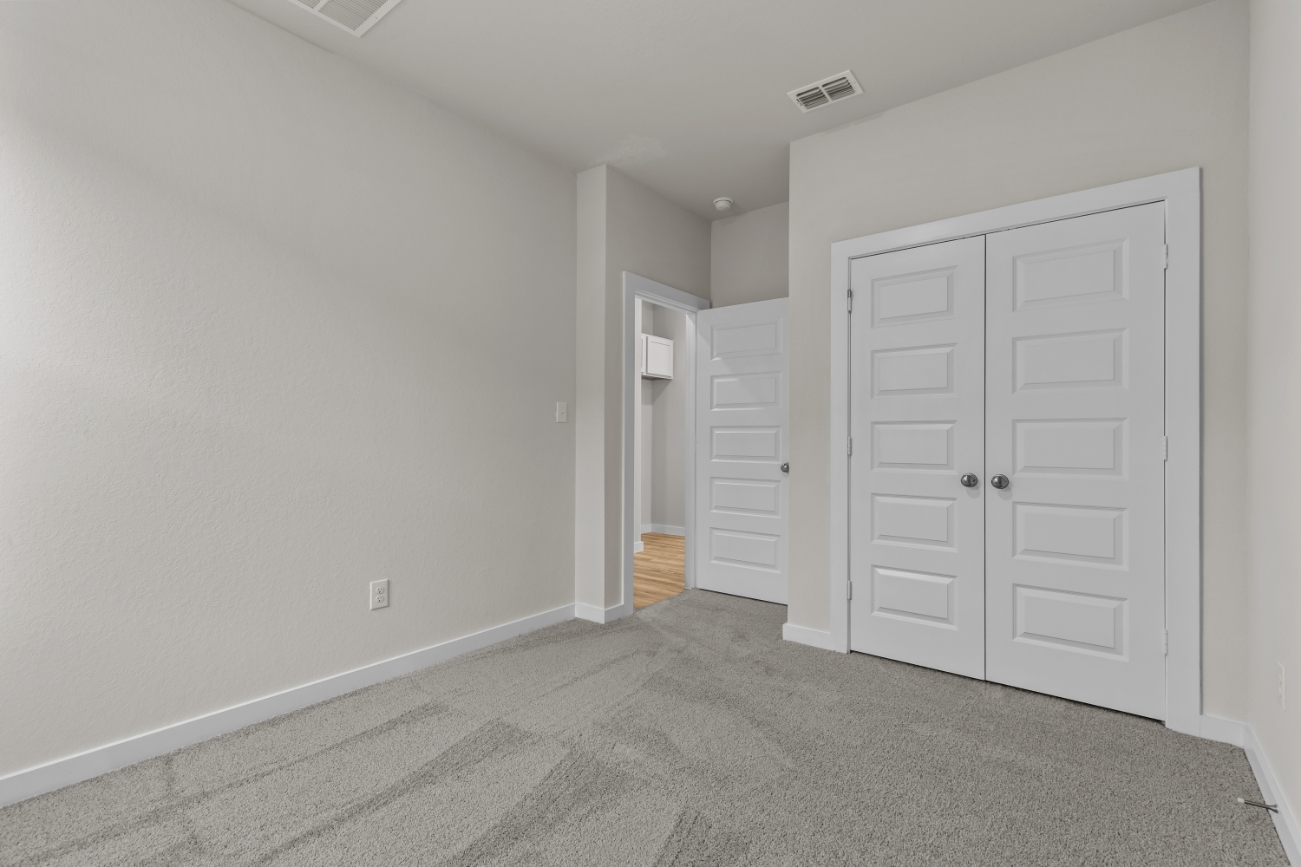 A room with white doors.