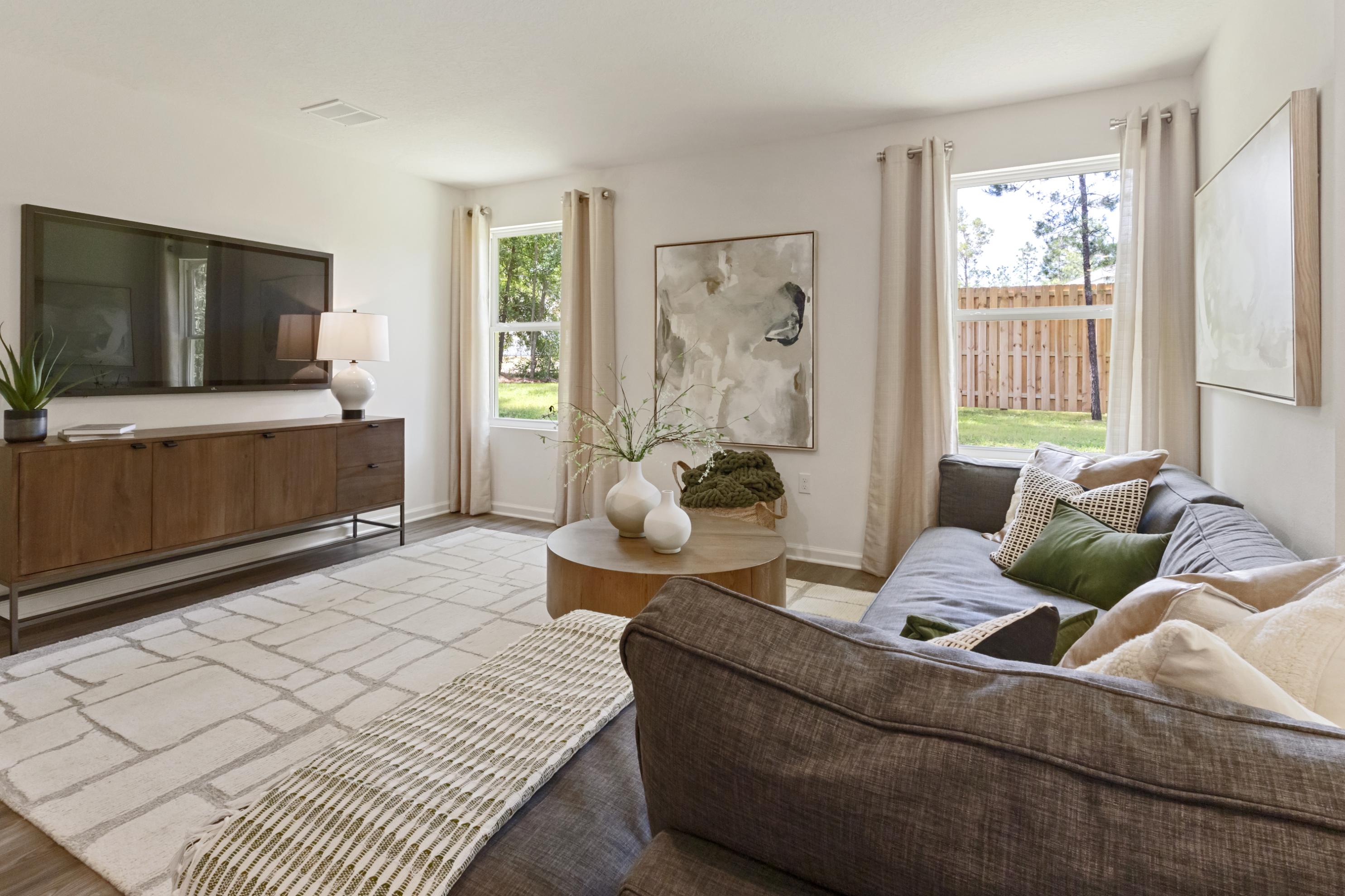 A living room with a couch and a coffee table.