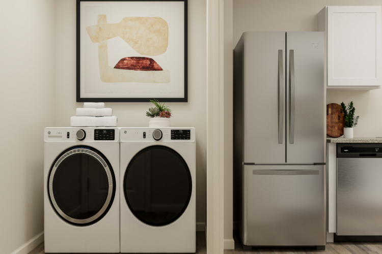 A white room with a washer and dryer.