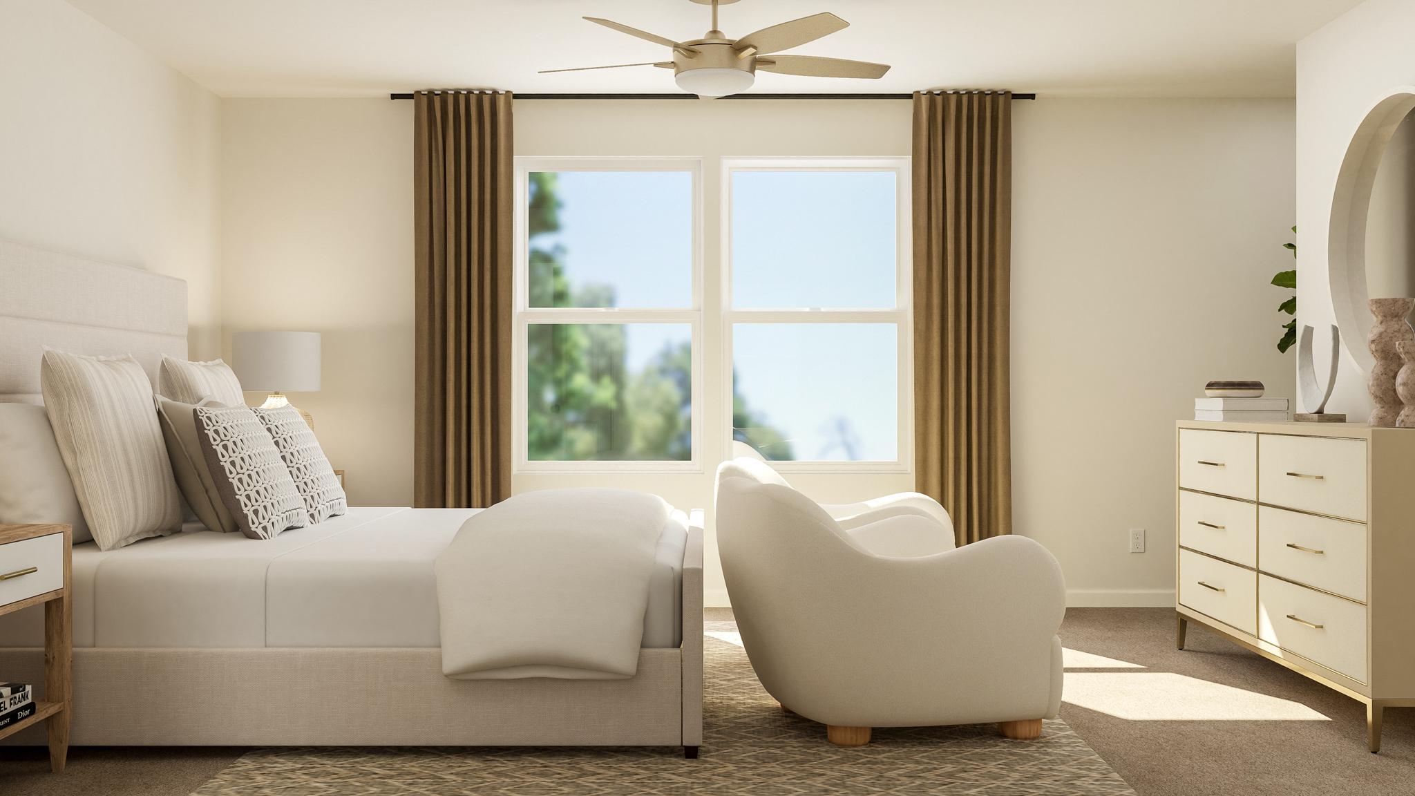 A living room with a couch and a fan.
